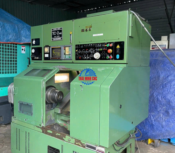 Máy Tiện TAKISAWA TC - 2 FANUC OTC CHỐNG TÂM 400MM